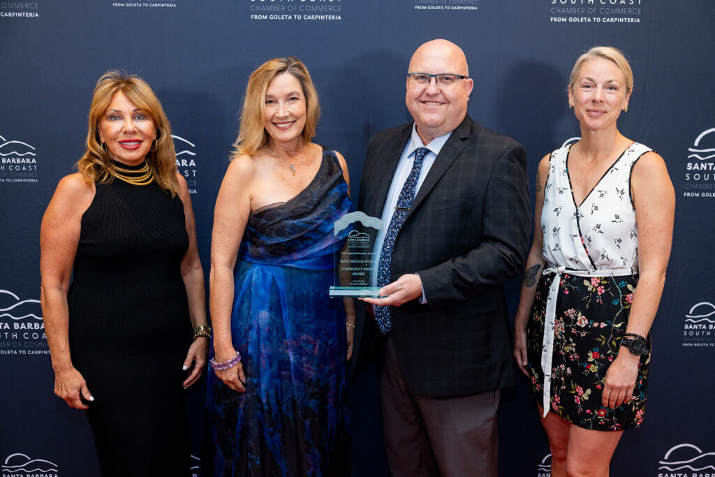 SBA staff poses with Chamber and Visit Santa Barbara staff with their award.