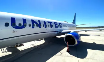 Photo of the side of a United plane