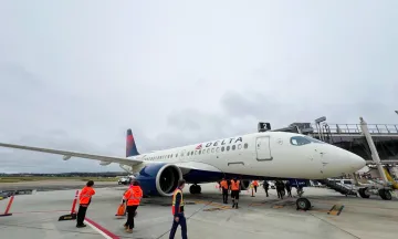 Delta airplane parked at the gate 