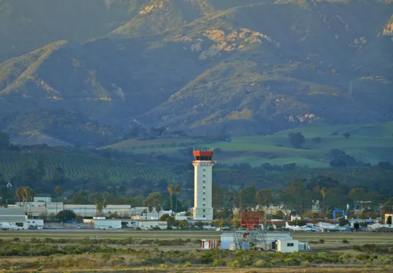 Santa Barbara Airport FAA Tower with mountains backdrop