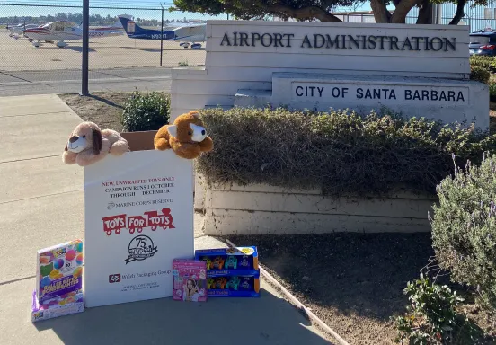 Toys for Tots Box in front of Airport Administration Building