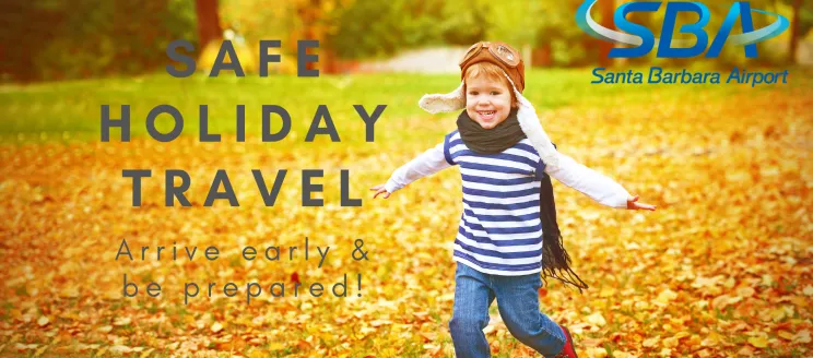 Safe Holiday Travel Tips with young boy running through fall leaves