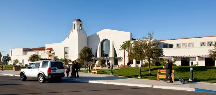 Entrance of Santa Barbara Airport with a car parked