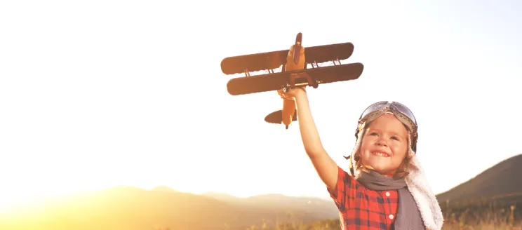 Young Boy with Toy Plane