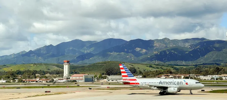 Wide shot of the SBA airfield and an American Airlines plane