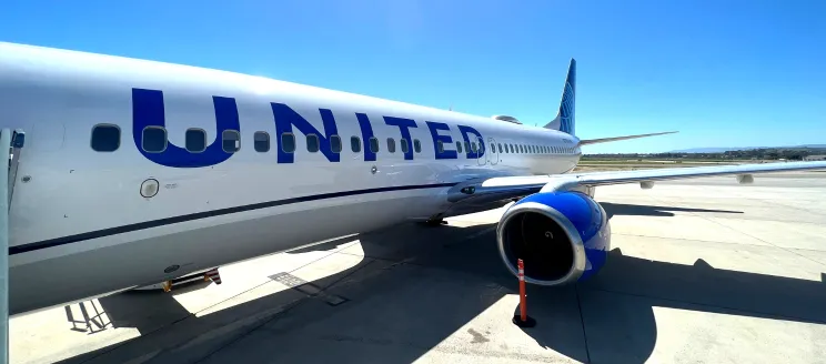 Photo of the side of a United plane