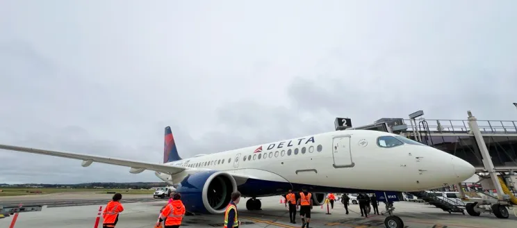 Delta airplane parked at the gate 