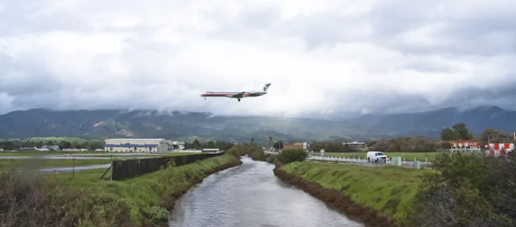 Plane descending over San Pedro Creek