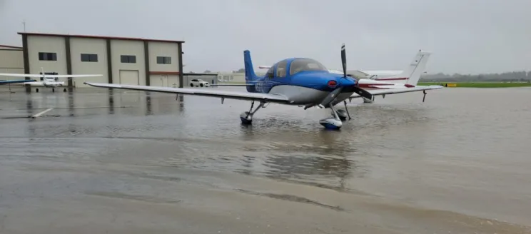 Flooded aircraft tie-down area