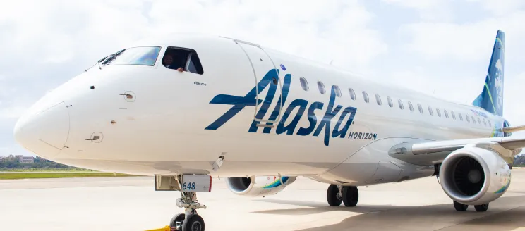 An Alaska Airlines plane sits on the SBA tarmac