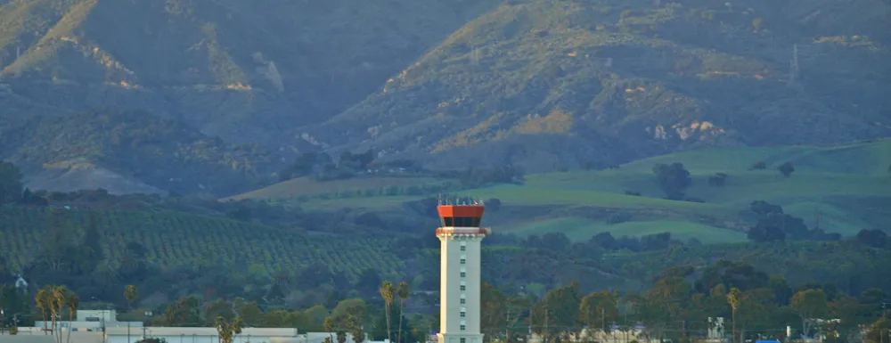 Santa Barbara Airport FAA Tower with mountains backdrop