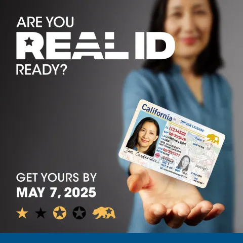 Photo of a person holding a drivers license with text that says are you real ID ready?