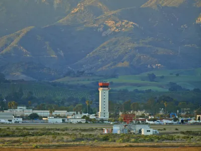 Santa Barbara Airport FAA Tower with mountains backdrop